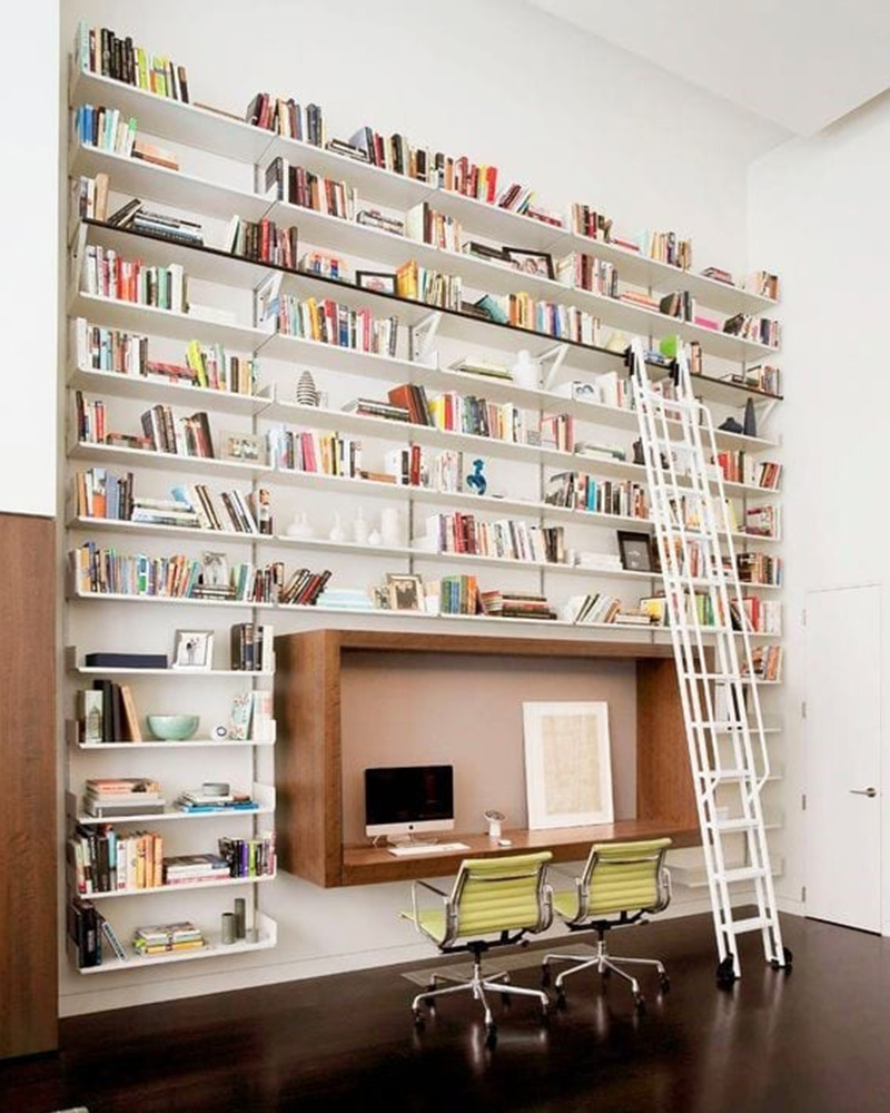 a book shelf converted into a home office